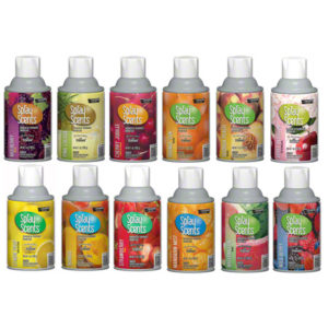 Image of eleven different metered TimeMist air freshener spray cans from the brand "Spray Scents," arranged in two rows, each labeled with various scents including berry, citrus, apple, and tropical fragrances. Product titled: "Assorted Fruit Scents Metered TimeMist Air Freshener," available in a case of 12.