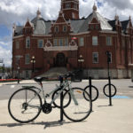 Bike locked to 200 series bike rack in front of town hall
