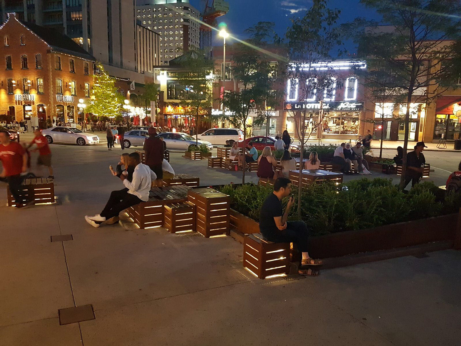 ByWard Market plaza at night with lit custom blocks