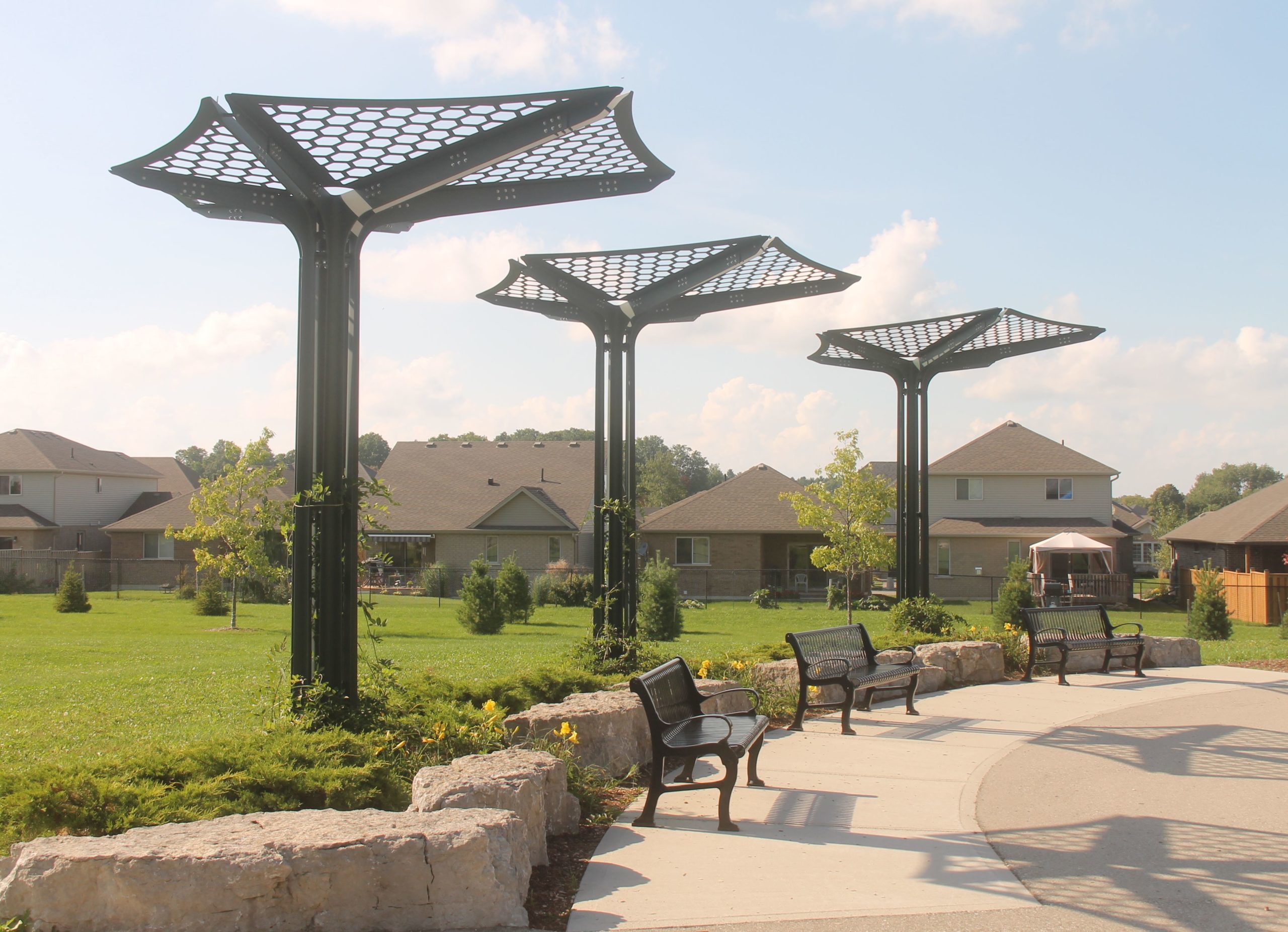 Three black custom living shade infrastructure