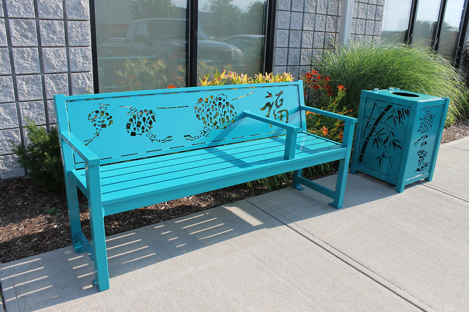 Turquoise laser cut modified 400 backed benches and trash container with chinese symbols