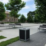 Black and Silver bin near benches and trees