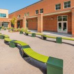 Green Lexicon seats with square modules in school yard