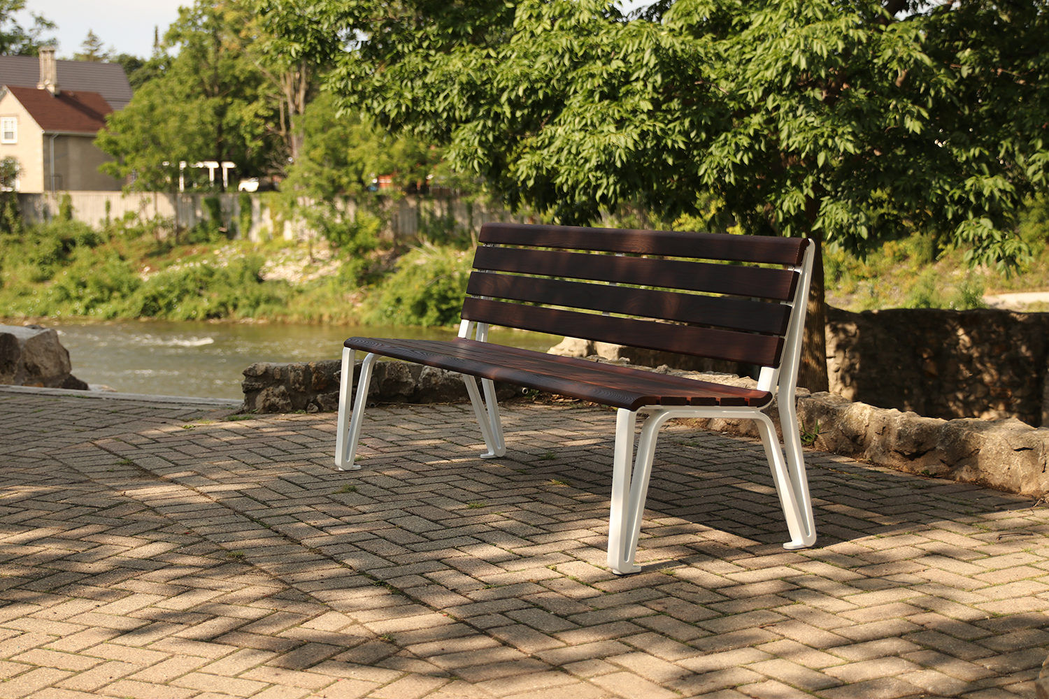 Iconic Backed Bench sitting under tree