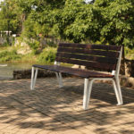 Iconic Backed Bench sitting under tree