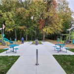 400 Cluster Seating with benches and trash at park