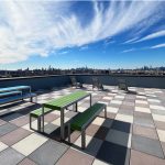 1050 Tables and Benches in High Density Polyethylene on roof-top patio