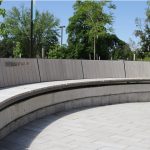 Curved Ogden Bench with custom wood at Lang Plaza