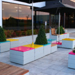 Pixel blocks with bright colored tops and plants