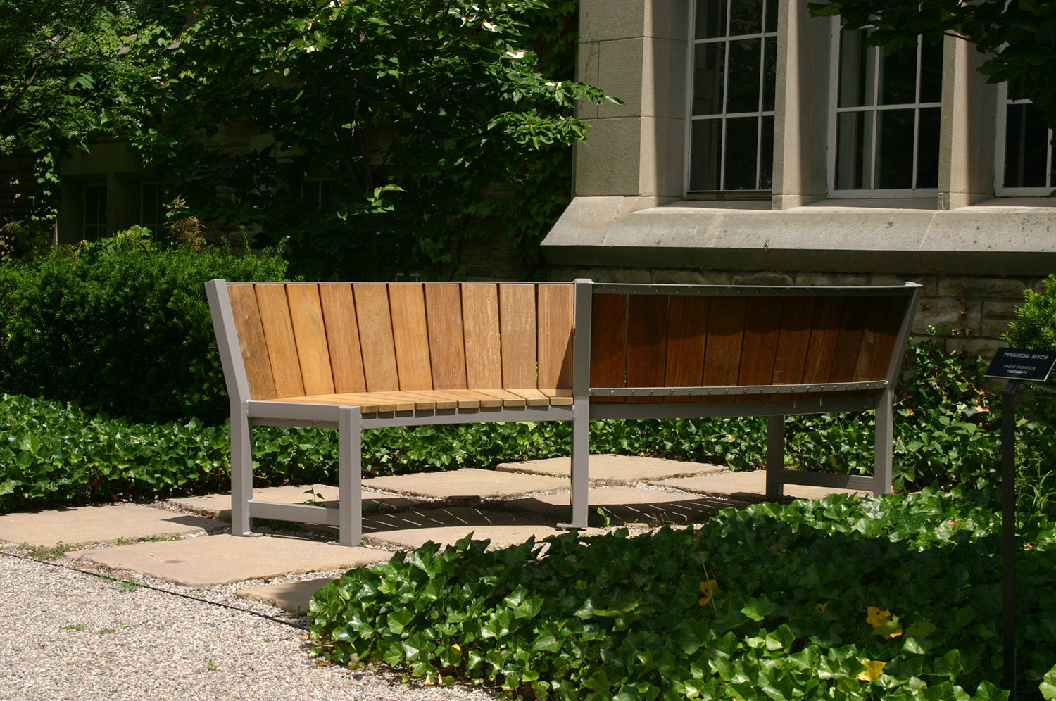 S Bench with facing seats in garden patio