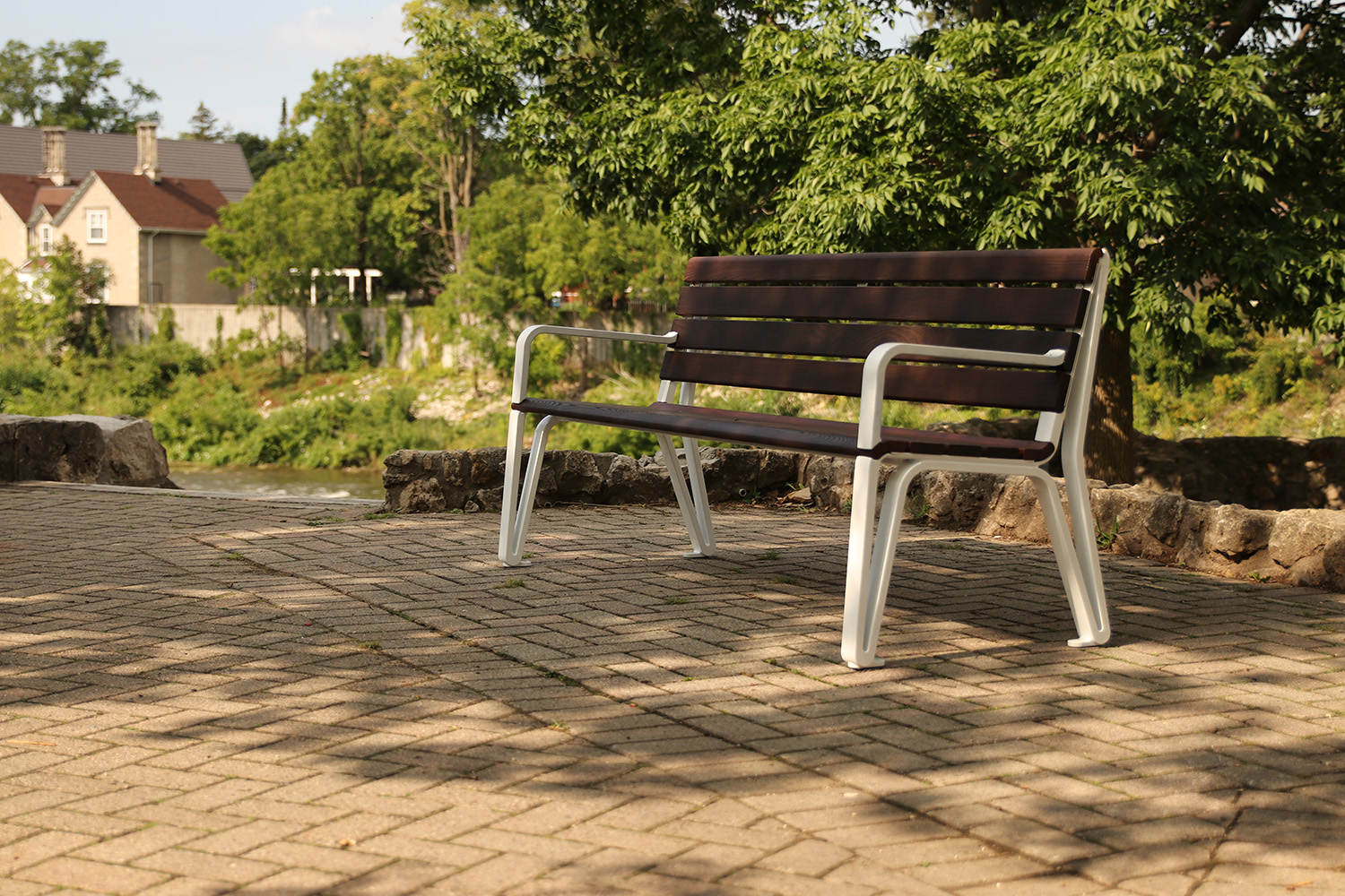 Iconic Backed Bench with Side Arms in park setting