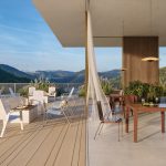 2700 Series - ALUM Collection of tables and chairs overlooking mountain landscape