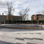 Custom curved perforated bench in Battery Park