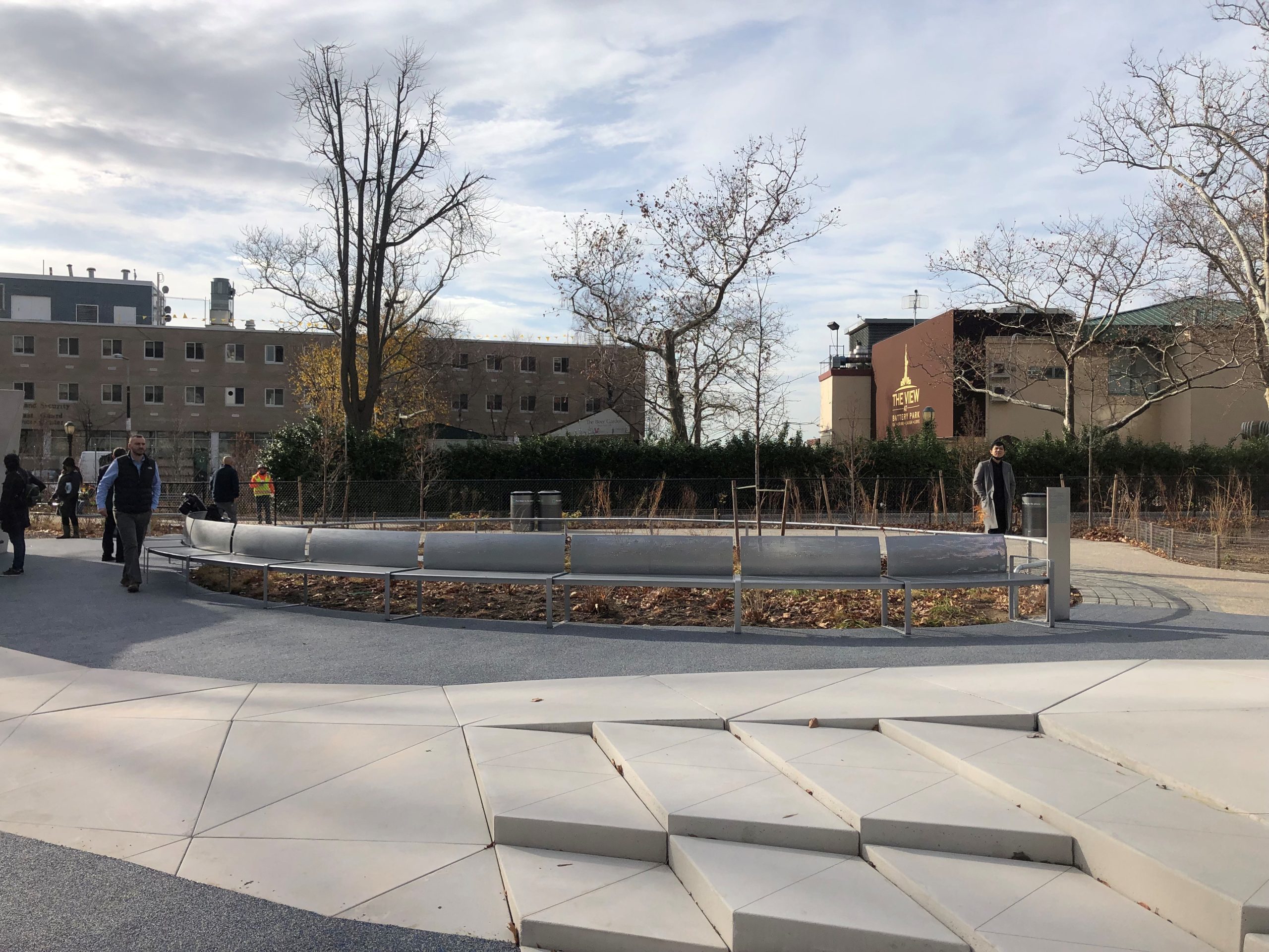 Custom curved perforated bench in Battery Park