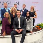 Maglin territory managers Jennifer, Brad, Amelie, Jeff, Barb, Andrew, Adam, and Jackie gather for a photo in the Maglin booth at ASLA 2025.